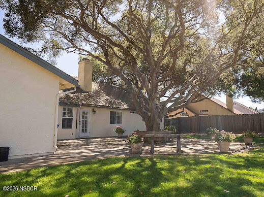 5011 Steeplegate Lane Santa Maria, CA 93455 - Photo 30 of 31 a view of a house with a yard