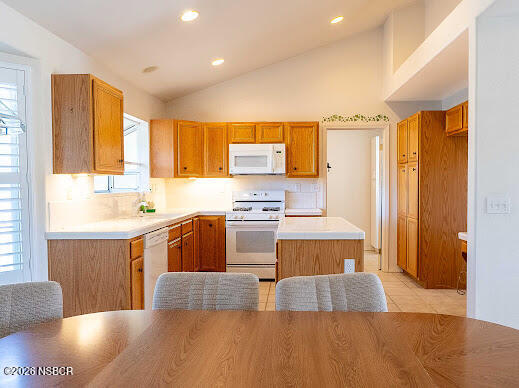 5011 Steeplegate Lane Santa Maria, CA 93455 - Photo 10 of 31 a kitchen with stainless steel appliances a stove top oven a sink a counter space and a window