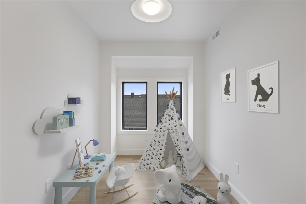 14 Bonair Street, Unit 14 Somerville, MA 02145 - Photo 26 of 39 a view of livingroom with furniture