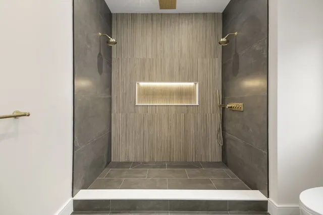 a view of a house with a balcony and stairs