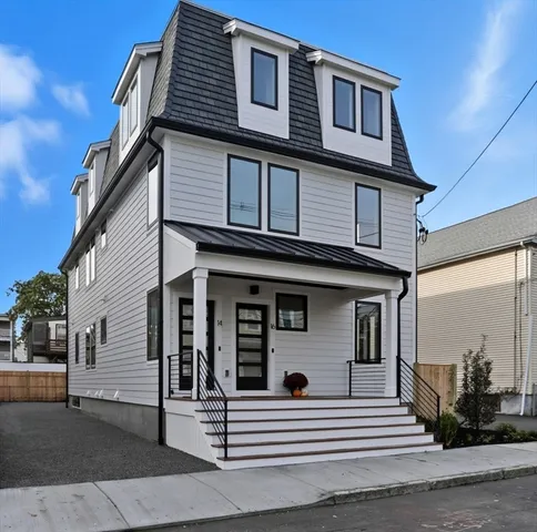 a view of a brick building from a balcony