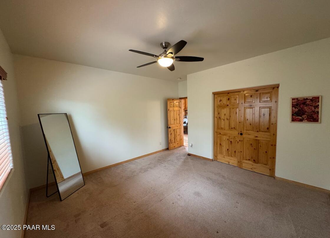1740 West Bumblebee Road Chino Valley, AZ 86323 - Photo 18 of 44 a view of empty room with ceiling fan