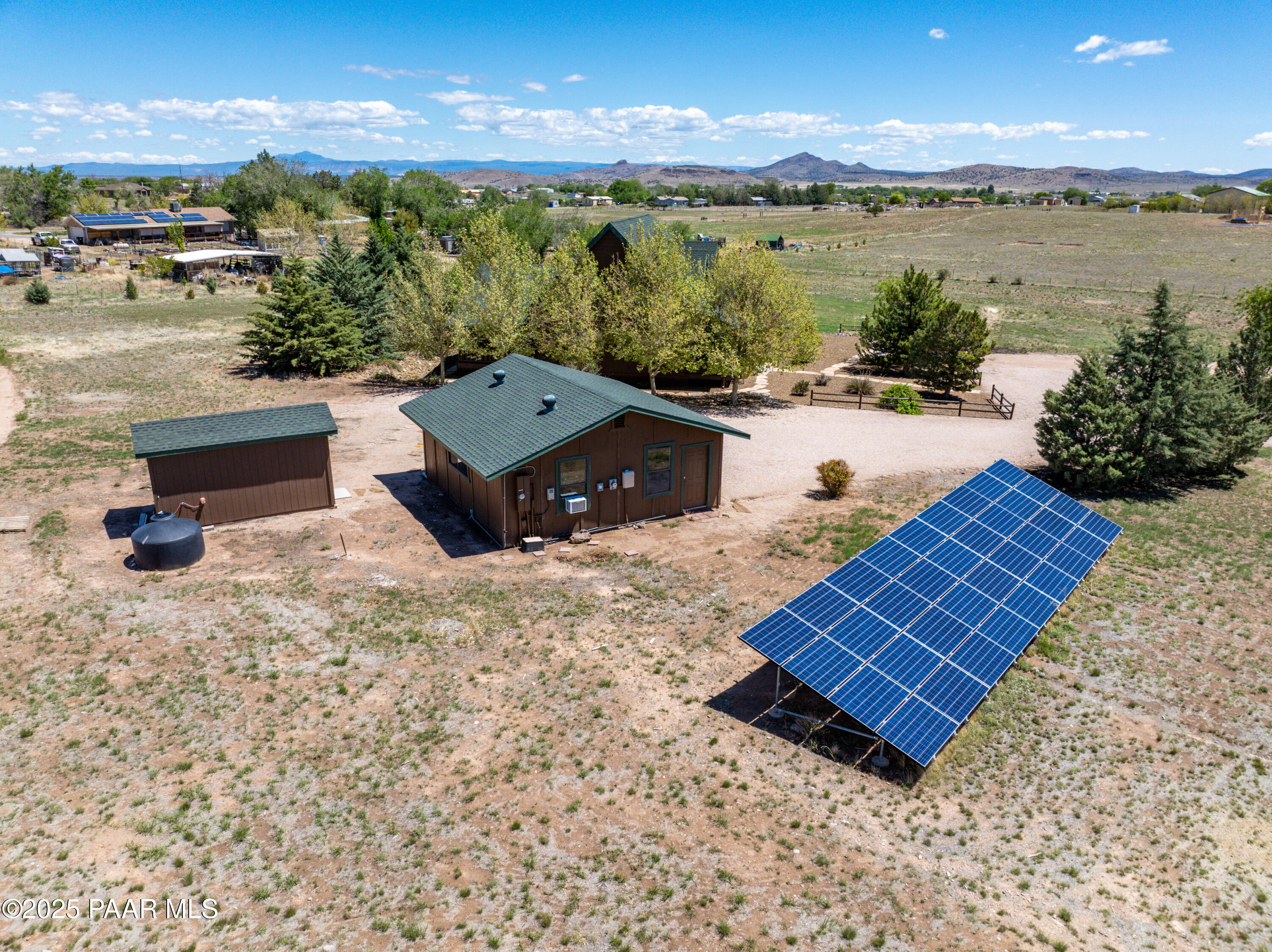 1740 West Bumblebee Road Chino Valley, AZ 86323 - Photo 21 of 44 a view of a lake with a mountain in the background