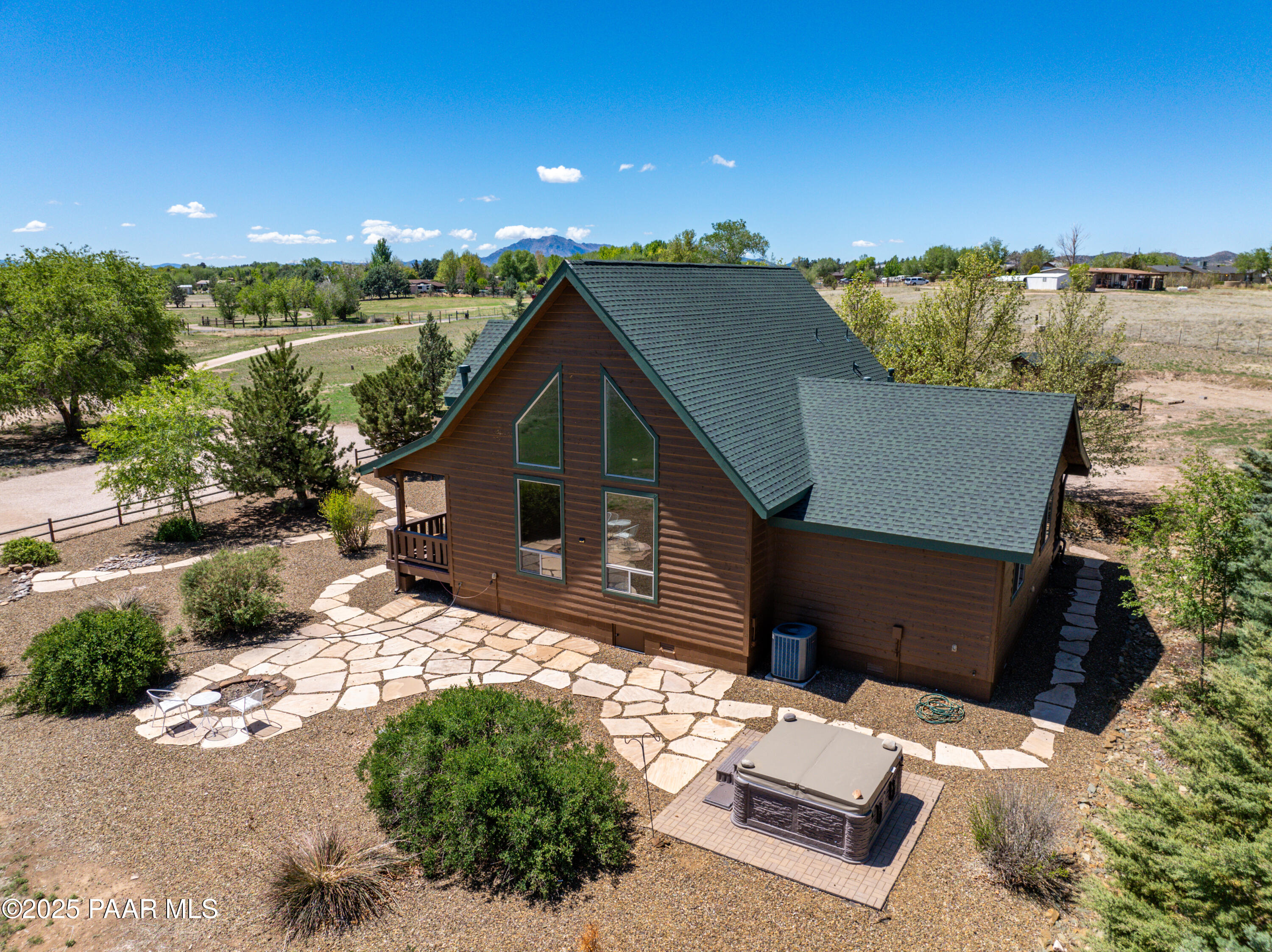 1740 West Bumblebee Road Chino Valley, AZ 86323 - Photo 22 of 44 a view of a house with a yard