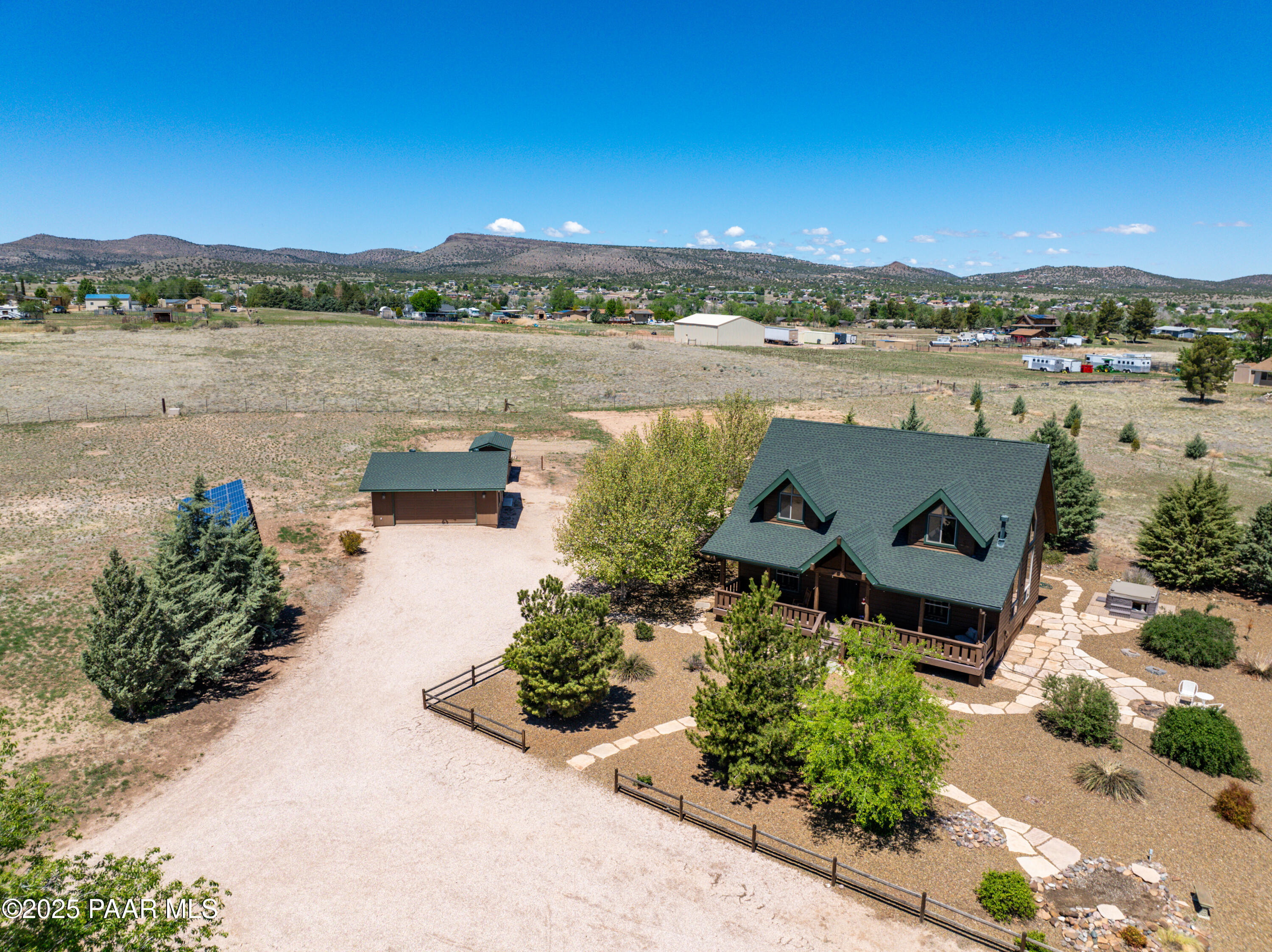 1740 West Bumblebee Road Chino Valley, AZ 86323 - Photo 31 of 44 an aerial view of a house with a lake view
