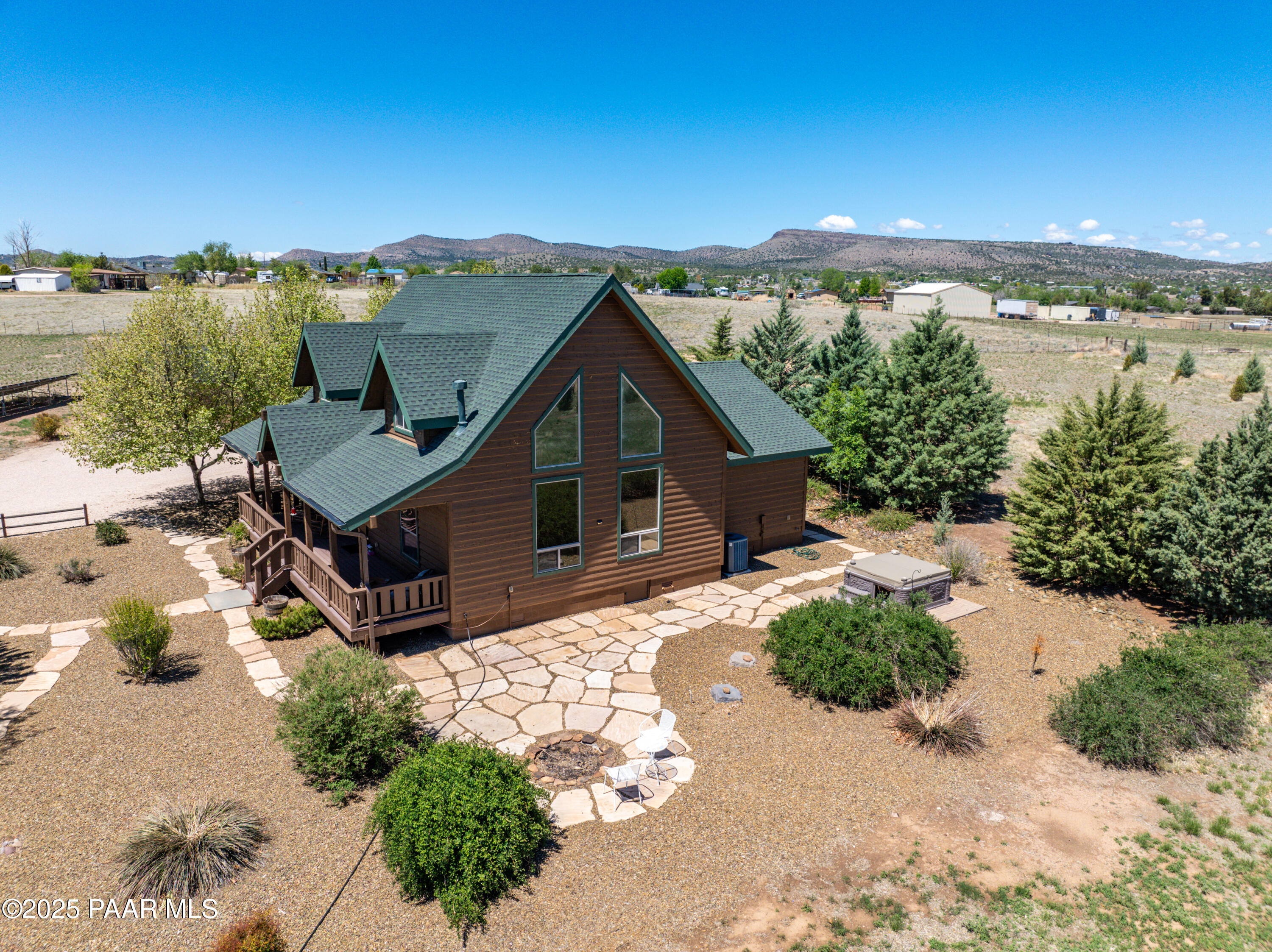 1740 West Bumblebee Road Chino Valley, AZ 86323 - Photo 33 of 44 a view of a house with a yard
