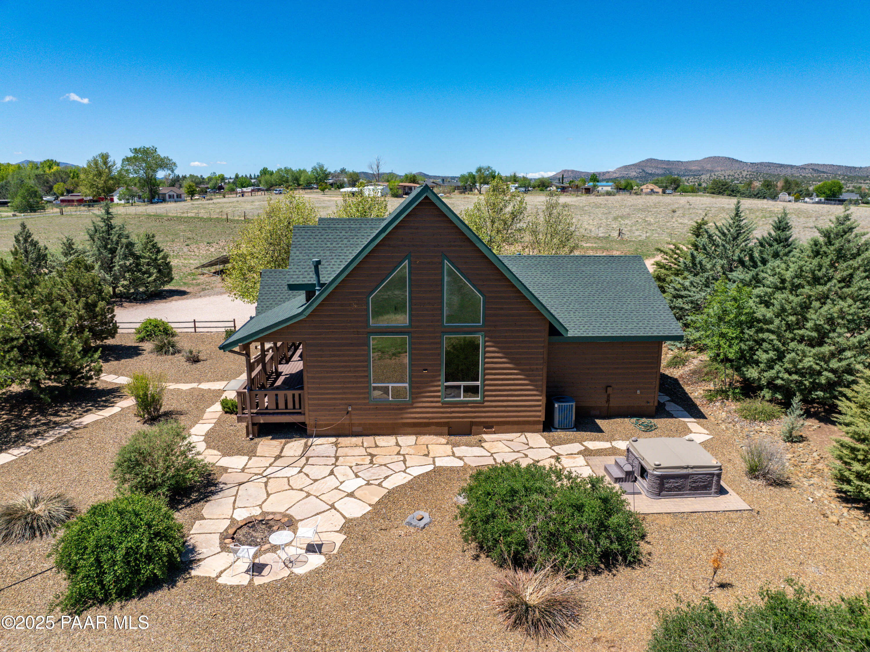 1740 West Bumblebee Road Chino Valley, AZ 86323 - Photo 34 of 44 a view of a house with a yard