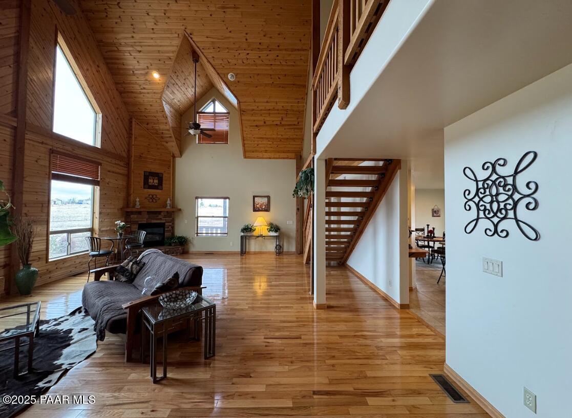 1740 West Bumblebee Road Chino Valley, AZ 86323 - Photo 4 of 44 a living room with furniture and a fireplace
