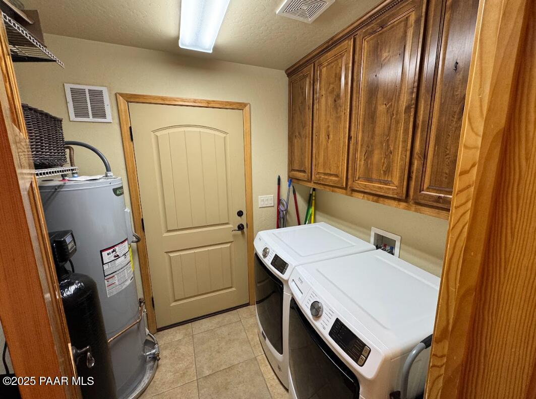 1740 West Bumblebee Road Chino Valley, AZ 86323 - Photo 10 of 44 a utility room with dryer and washer