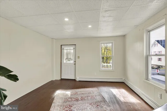 an empty room with windows