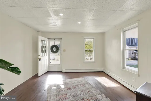 an empty room with windows