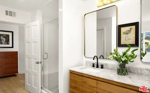 a white bath tub sitting in a bathroom