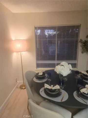 a room with furniture and a lamp