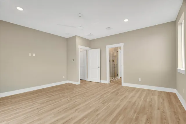 a kitchen with stainless steel appliances granite countertop a sink a stove a microwave and cabinets