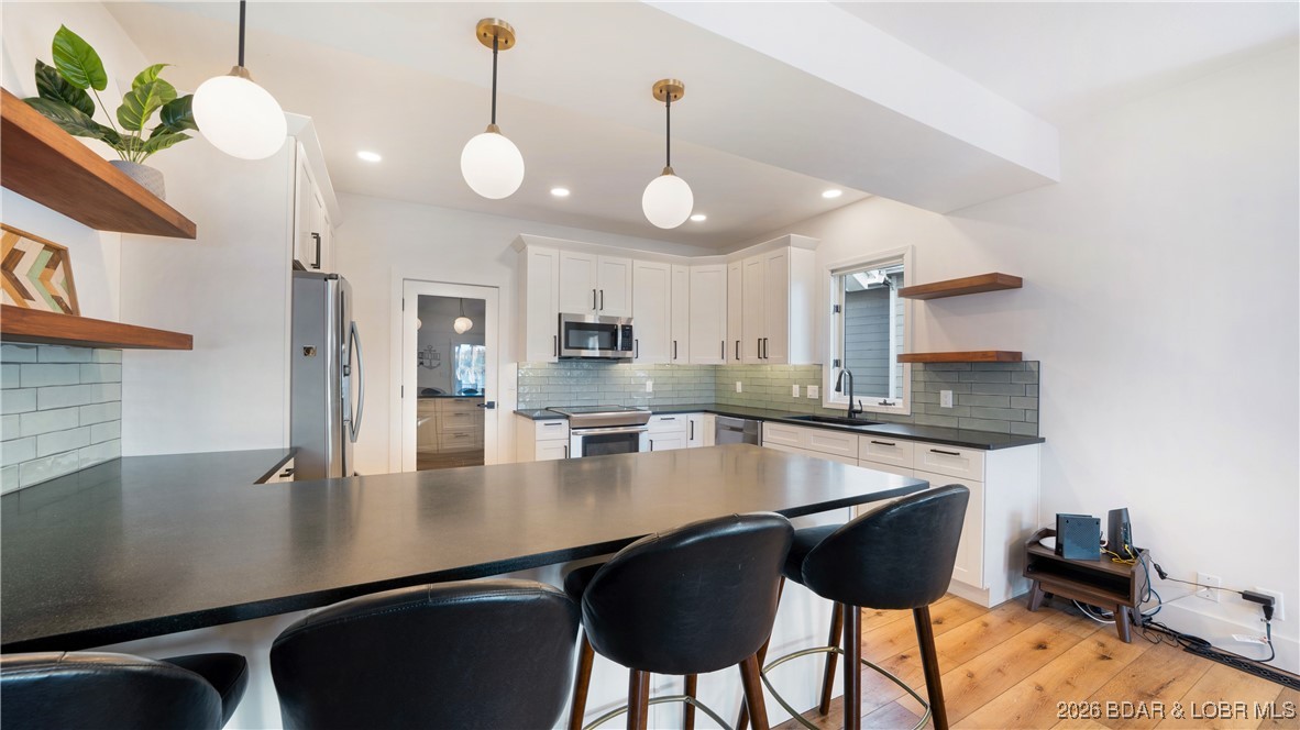 2268 Breezy Acres Road Osage Beach, MO 65065 - Photo 16 of 49 Remodeled kitchen