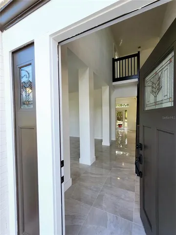 an empty room with windows