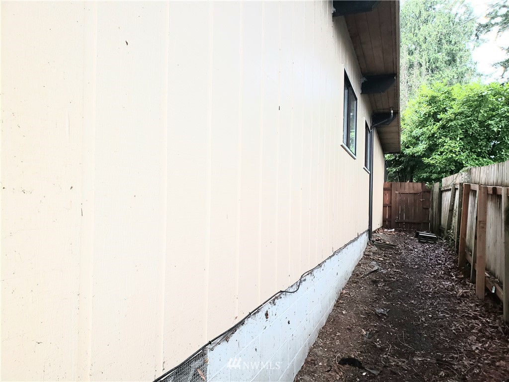 8690 Illahee Road Northeast Bremerton, WA 98311 - Photo 16 of 40 a view of backyard with pathway