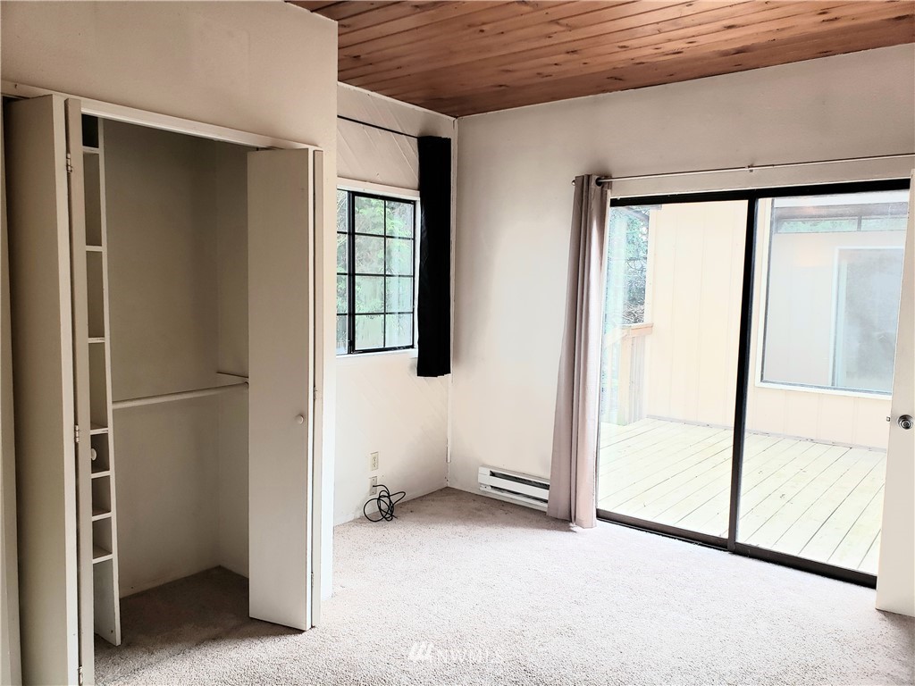 8690 Illahee Road Northeast Bremerton, WA 98311 - Photo 34 of 40 a view of an empty room with a window
