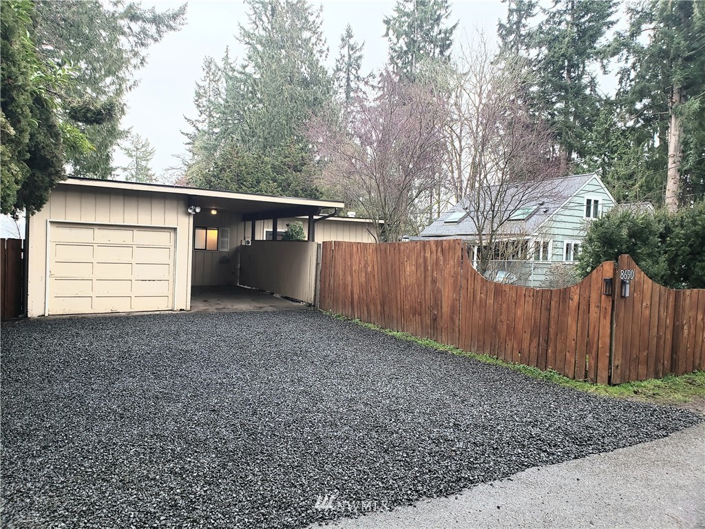 8690 Illahee Road Northeast Bremerton, WA 98311 - Photo 5 of 40 a view of backyard and wooden fence
