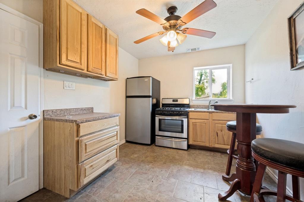 2396 Riverside Drive Denton, TX 76208 - Photo 22 of 39 Workshop Kitchen
