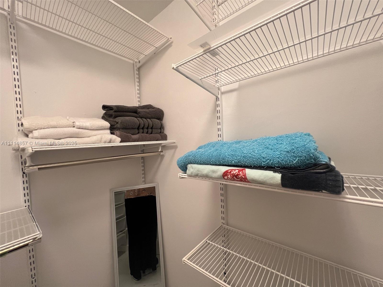 100 Lincoln Road, Unit 1207 Miami Beach, FL 33139 - Photo 19 of 54 a utility room with dryer and washer