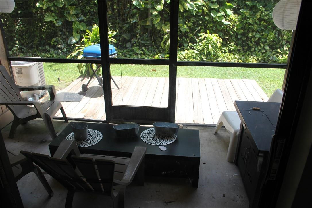 10932 West Sample Road, Unit F2 Coral Springs, FL 33065 - Photo 18 of 23 a view of a dining room with furniture window and outside view