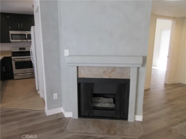 a living room with a fireplace