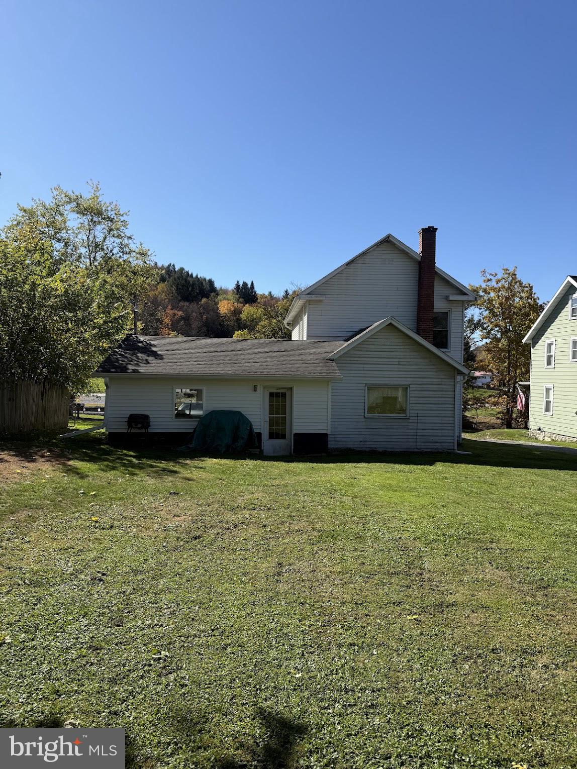 86 Lynn Street Madera, PA 16661 - Photo 2 of 13 a front view of a house with a yard