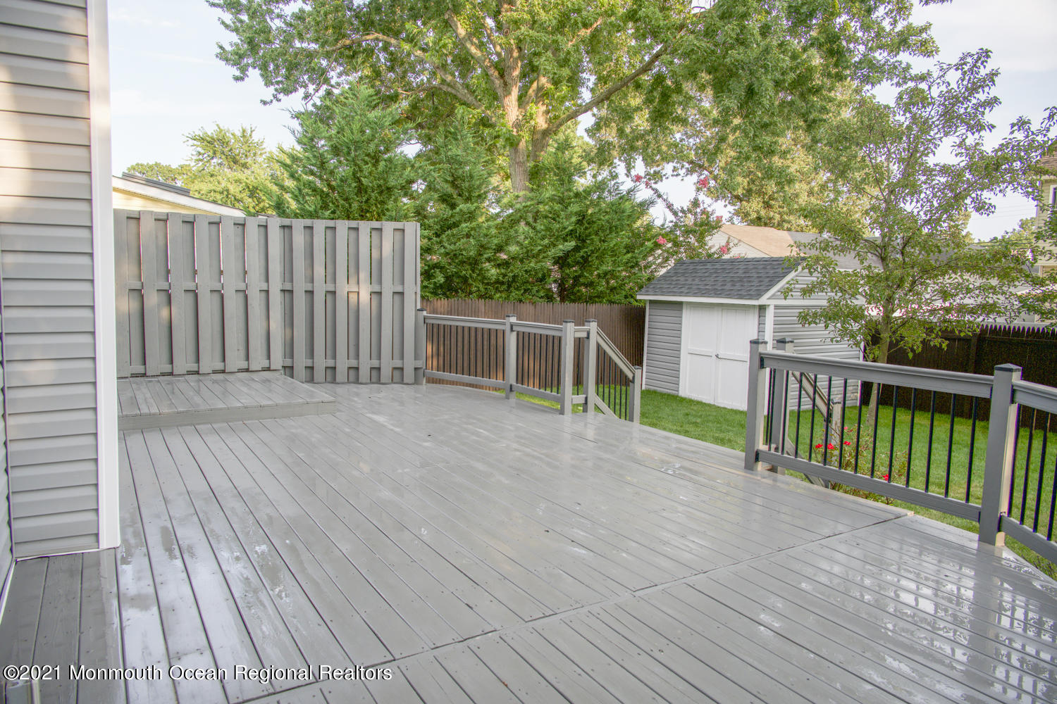 2230 Rogers Road Point Pleasant, NJ 08742 - Photo 8 of 51 a view of a house with a deck