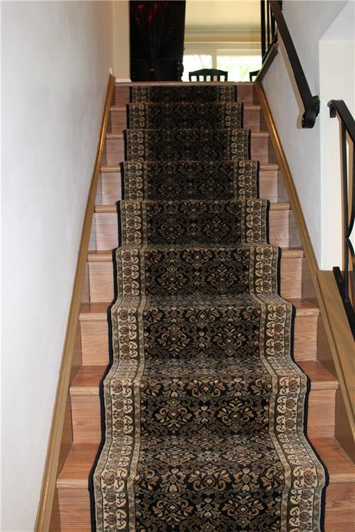 Foyer step from lower level to main level of home.