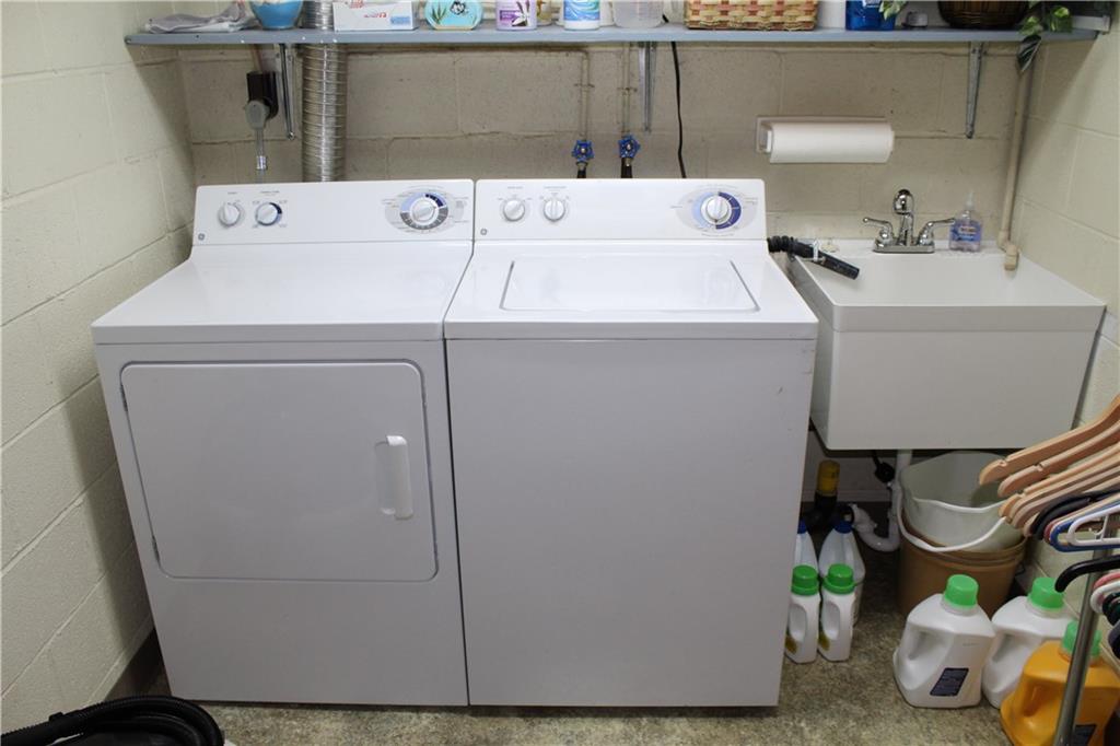 1107 Countryside Drive McKees Rocks, PA 15136 - Photo 24 of 25 Washer and dryer will stay with this town home which also a laundry tub. There is no appliance you will need to purchase.