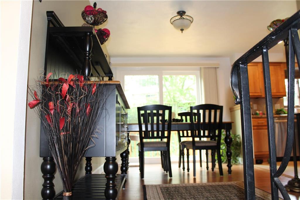New laminate flooring adds warmth and richness to this formal dining area.  Holidays will be a breeze with plenty of room to entertain.  All new lighting, molding and interior doors.