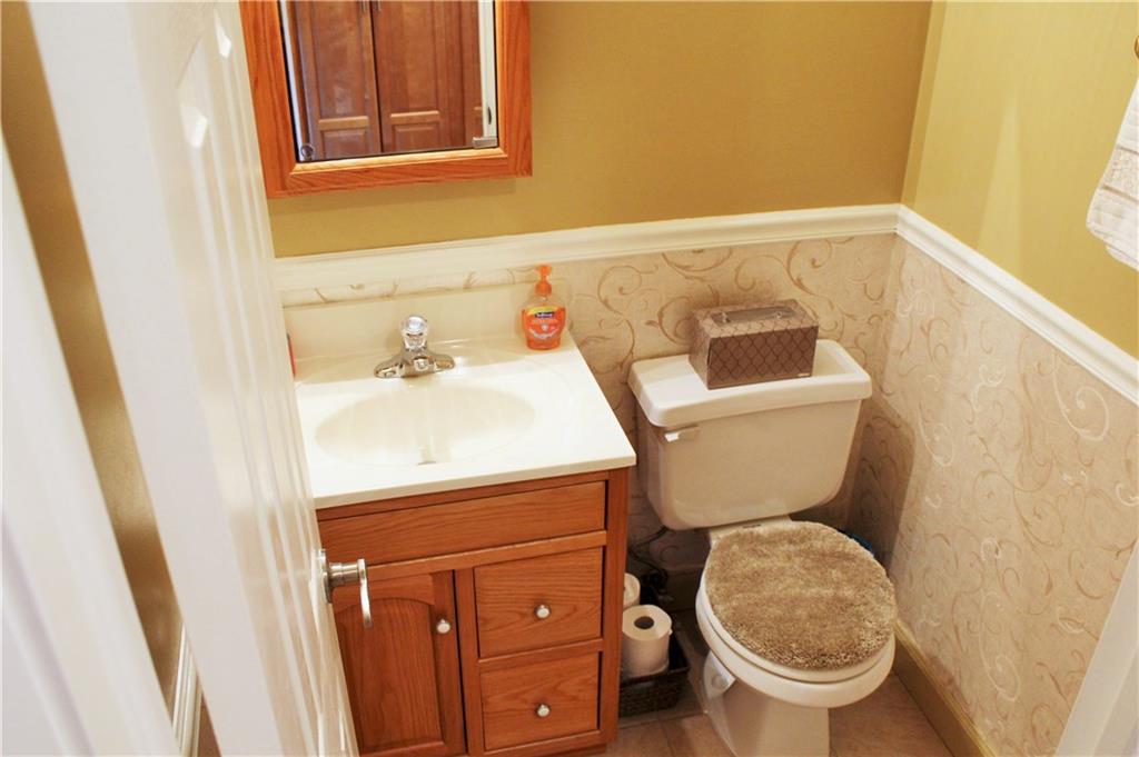 1107 Countryside Drive McKees Rocks, PA 15136 - Photo 9 of 25 Half bath on main floor offers convenience for your family and guests.