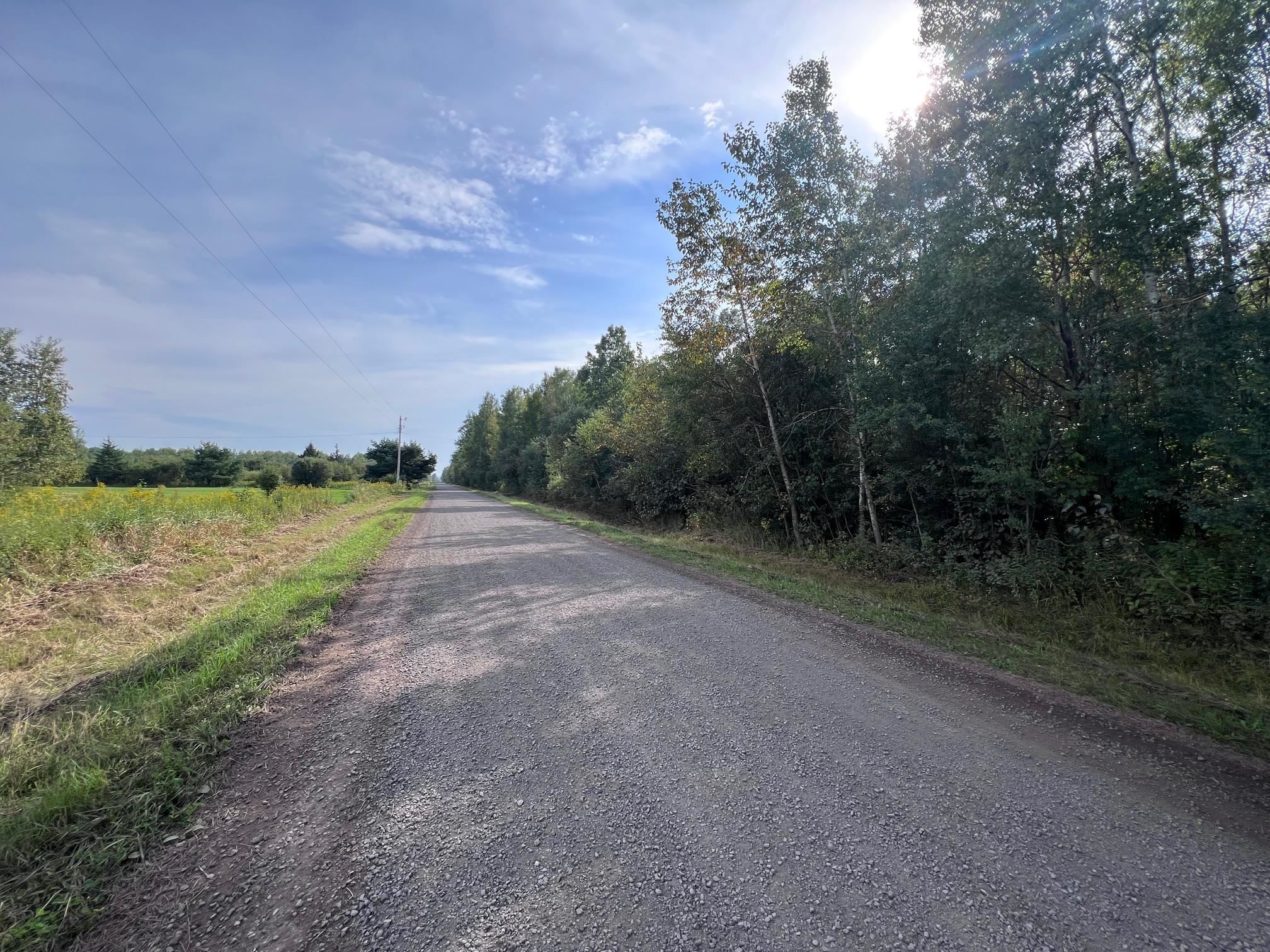 4725 South Barnes Road Superior, WI 54880 - Photo 2 of 3 View of dirt / gravel road featuring a view of rural / pastoral area