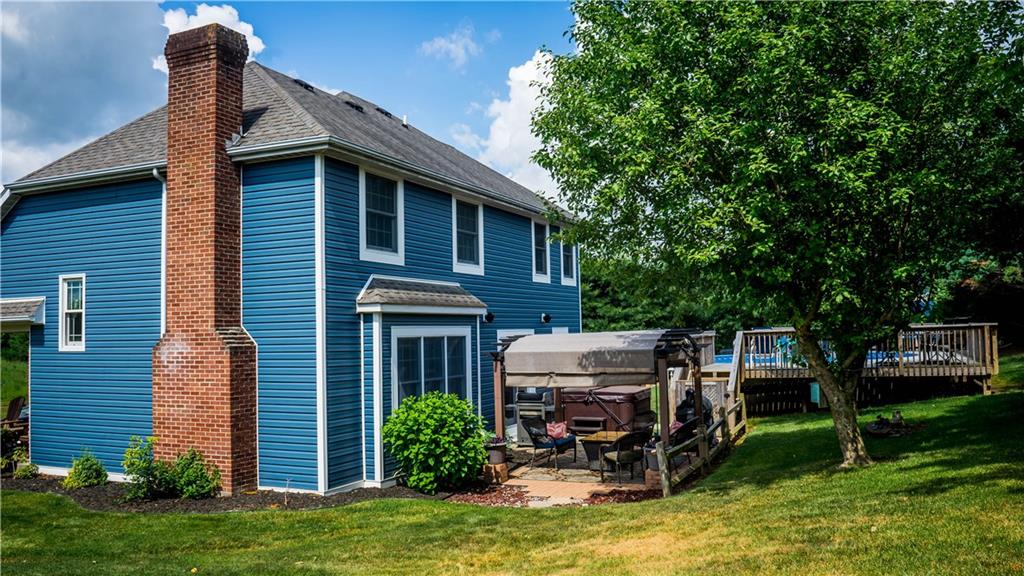 106 East Brewster Road Butler, PA 16001 - Photo 21 of 25 Partially Covered Patio with Comfortable Seating Area
