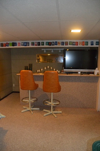 636 Reynoldswood Road Dixon, IL 61021 - Photo 20 of 25 a living room with furniture and a flat screen tv