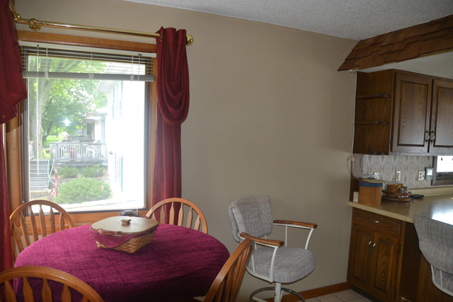 636 Reynoldswood Road Dixon, IL 61021 - Photo 5 of 25 a view of a dining room with furniture window and outside view