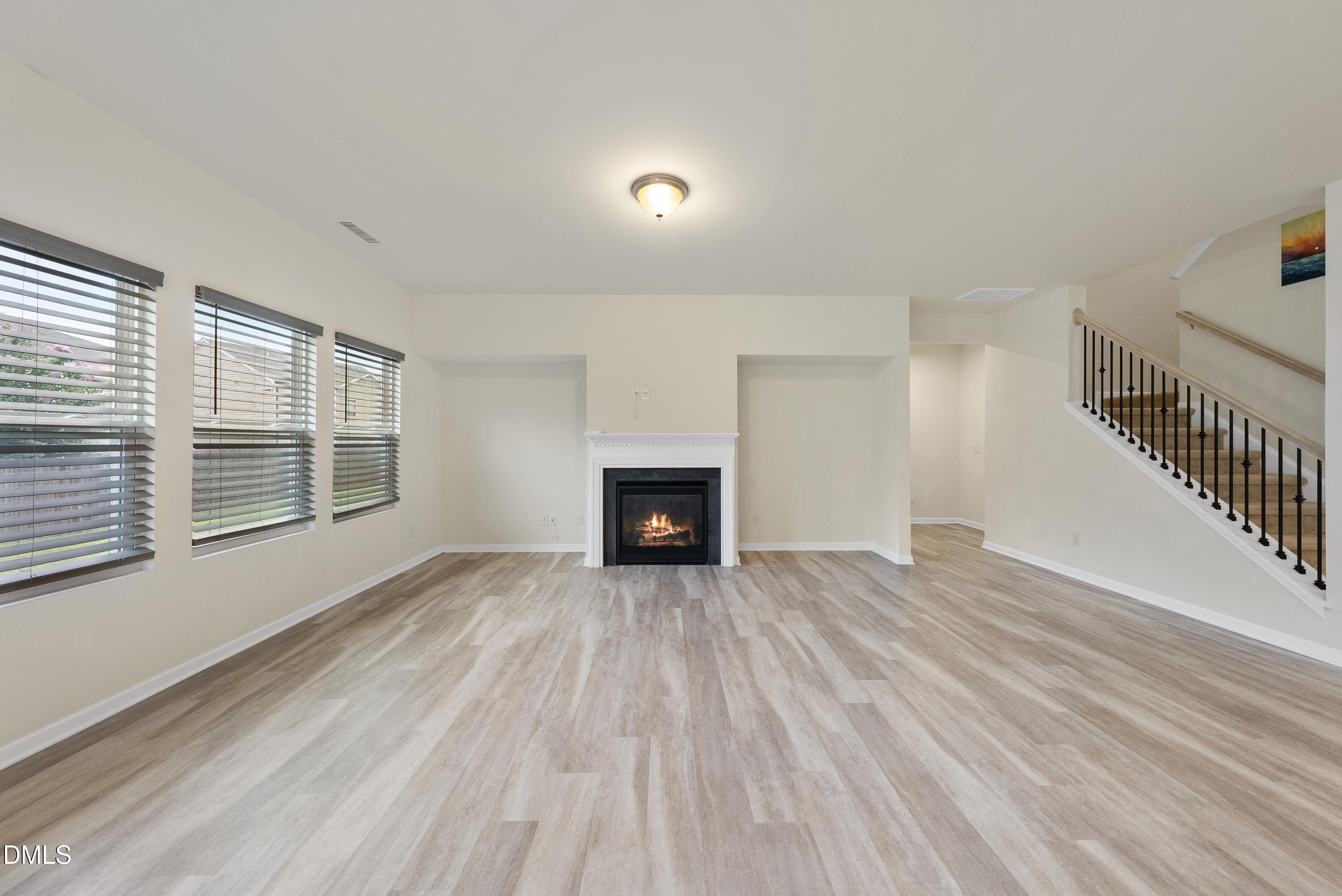 905 Lippincott Road Durham, NC 27703 - Photo 9 of 24 Living Room with Gas Log Fireplace.