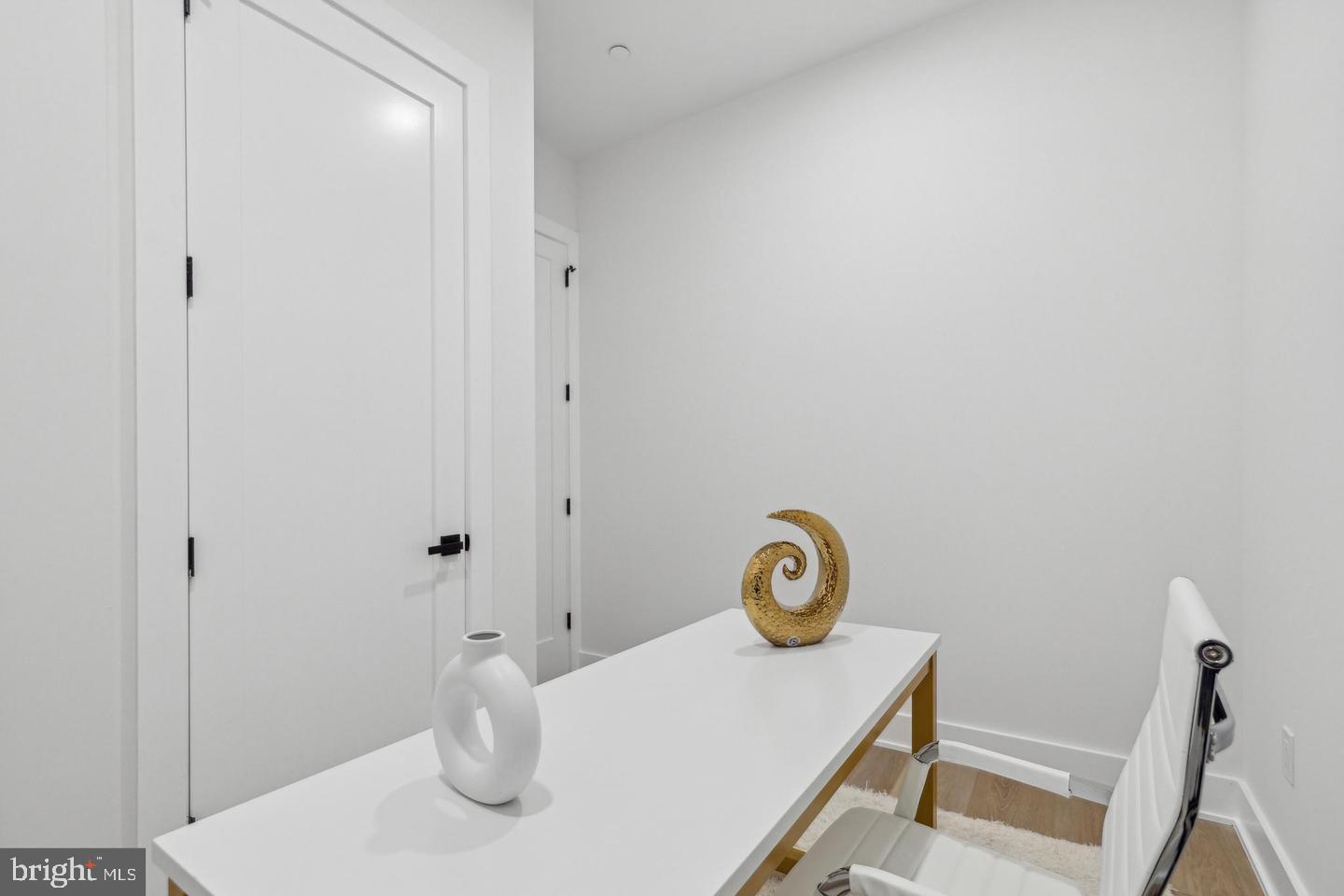 705 Quincy Street Northeast, Unit 2 Washington, DC 20017 - Photo 11 of 15 a bathroom with a toilet and a sink