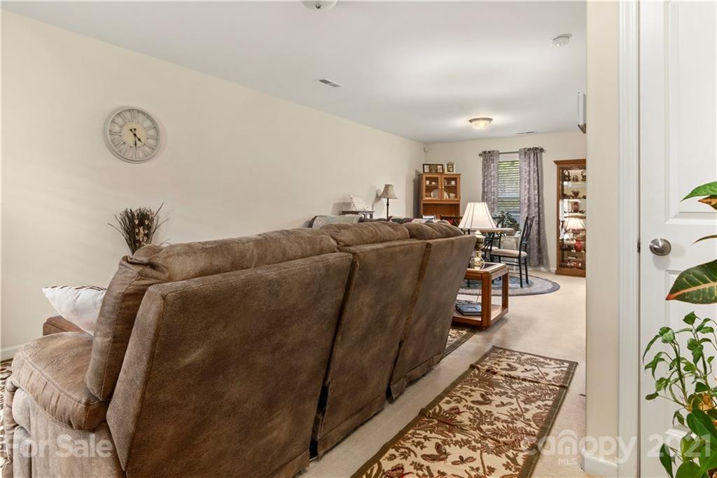 2068 Gunnars Ridge Road Lancaster, SC 29720 - Photo 8 of 28 a living room with furniture and a rug