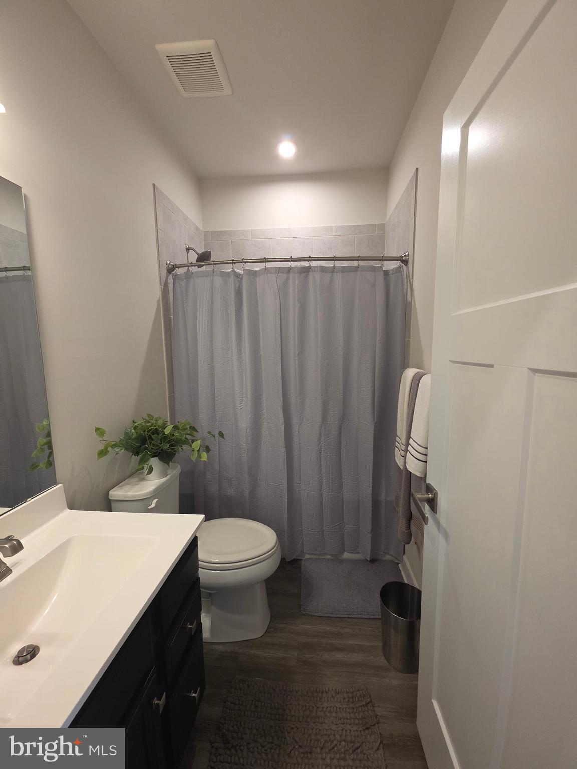 14510 Hunts Farm Road Brandywine, MD 20613 - Photo 65 of 74 a bathroom with a sink toilet and shower