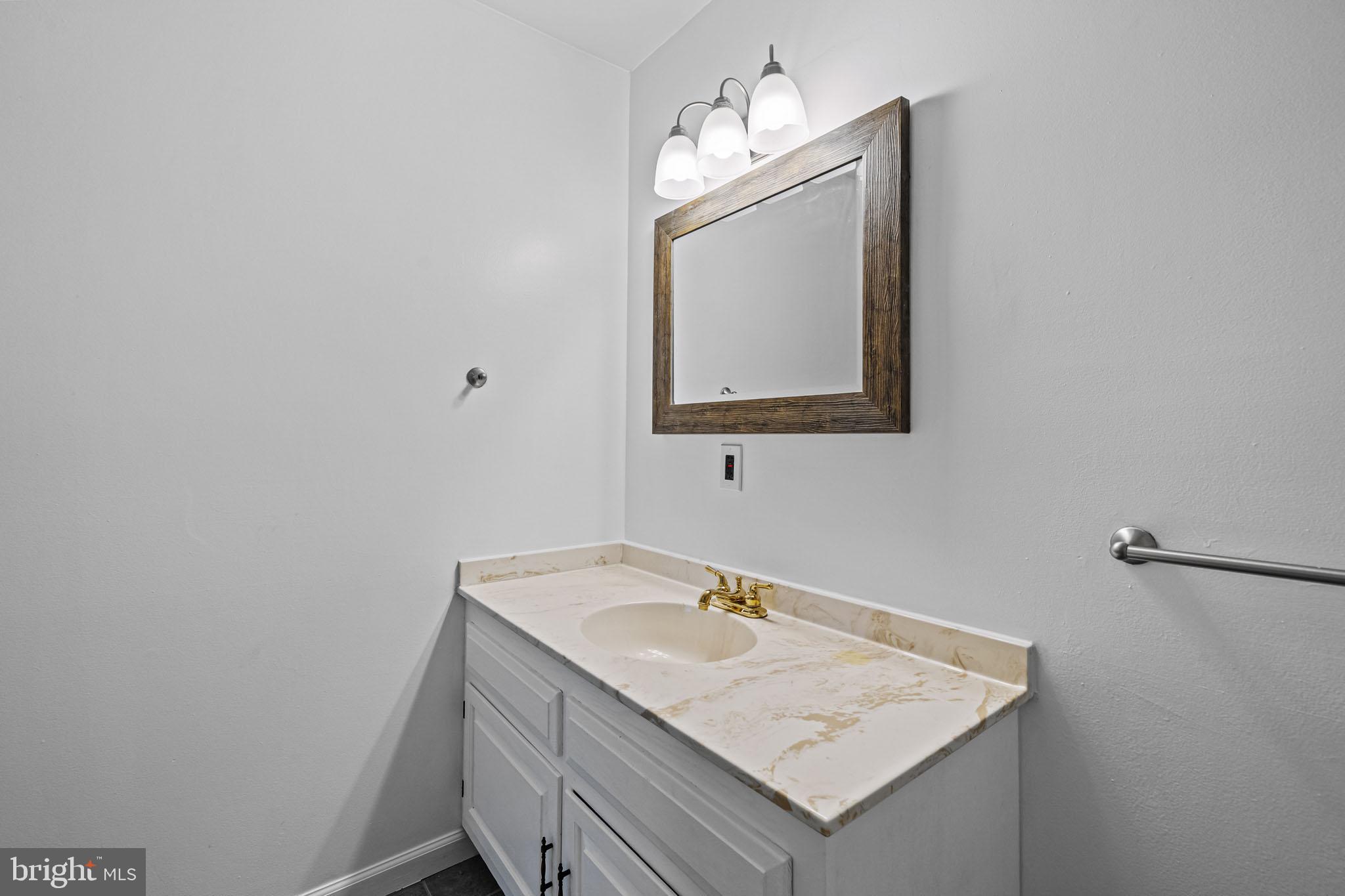 820 Parran Road St. Leonard, MD 20685 - Photo 19 of 25 Upstairs Hall Bathroom