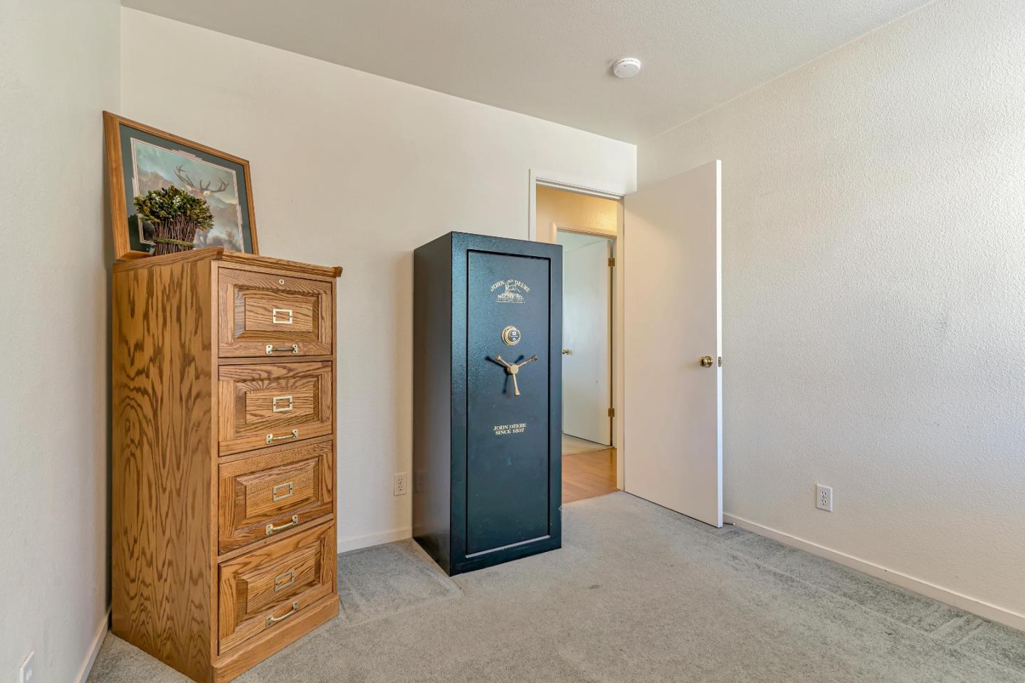 440 Meyer Circle Gonzales, CA 93926 - Photo 24 of 45 an empty room with closet and wooden door