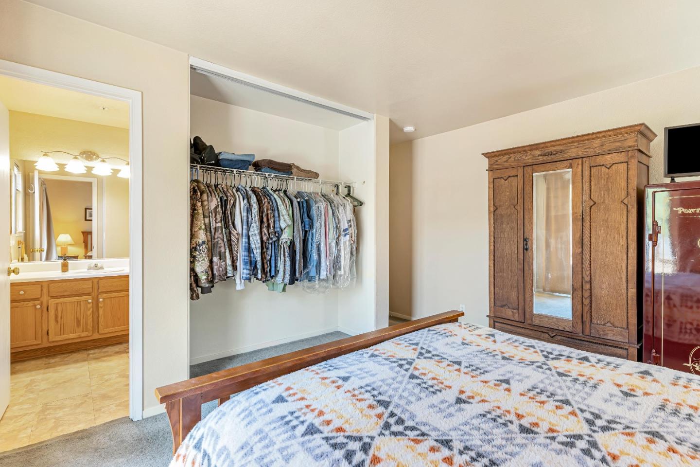 440 Meyer Circle Gonzales, CA 93926 - Photo 30 of 45 a bedroom with a bed and a view of bathroom