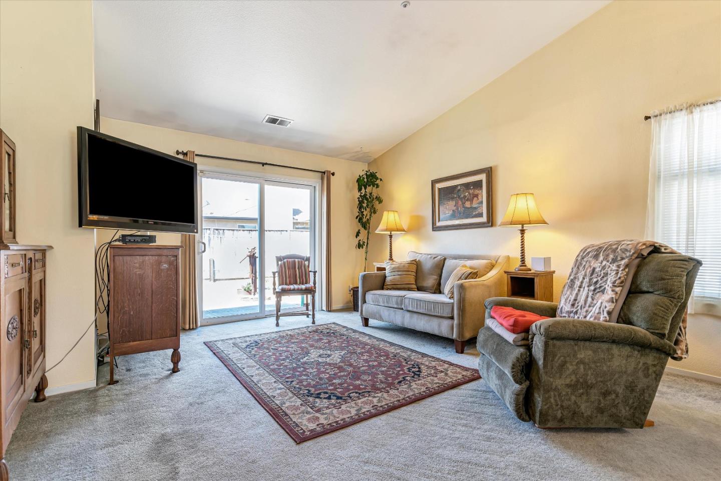 440 Meyer Circle Gonzales, CA 93926 - Photo 7 of 45 a living room with furniture and a flat screen tv
