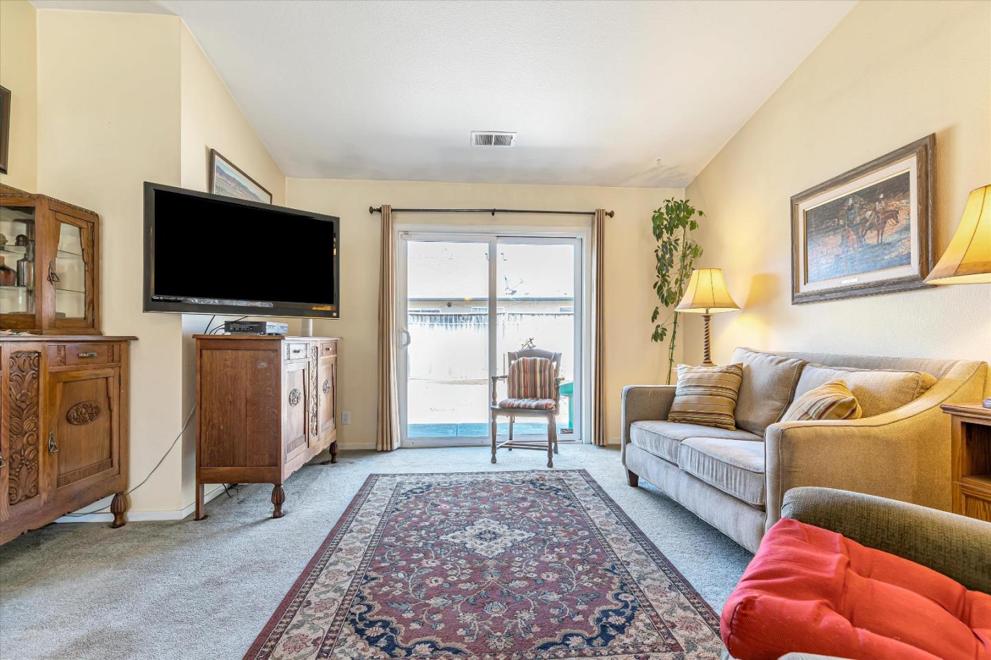 440 Meyer Circle Gonzales, CA 93926 - Photo 8 of 45 a living room with furniture and a flat screen tv