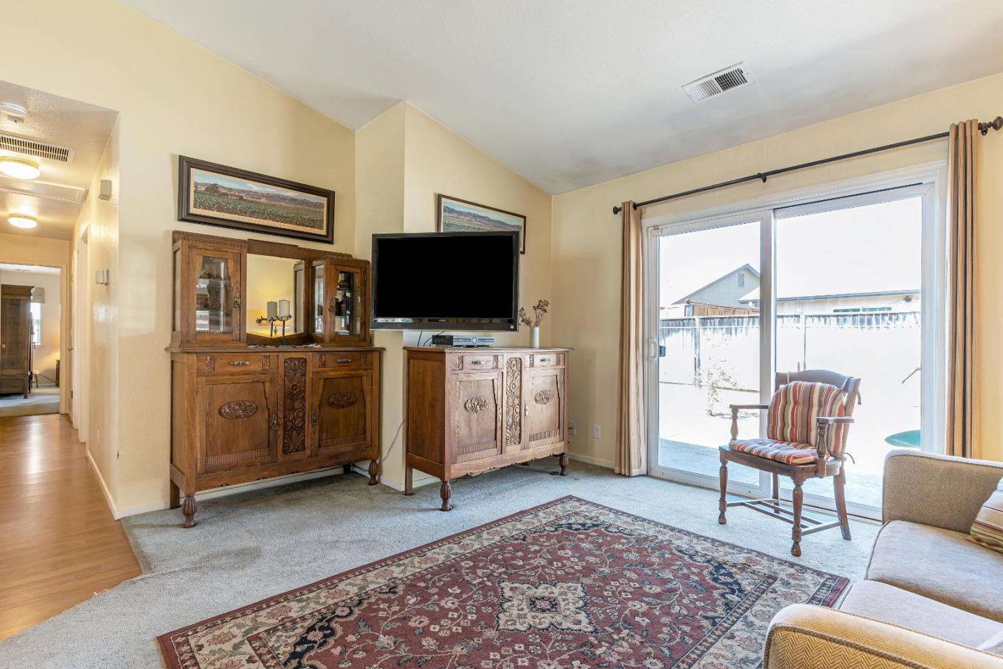 440 Meyer Circle Gonzales, CA 93926 - Photo 9 of 45 a living room with furniture and a flat screen tv
