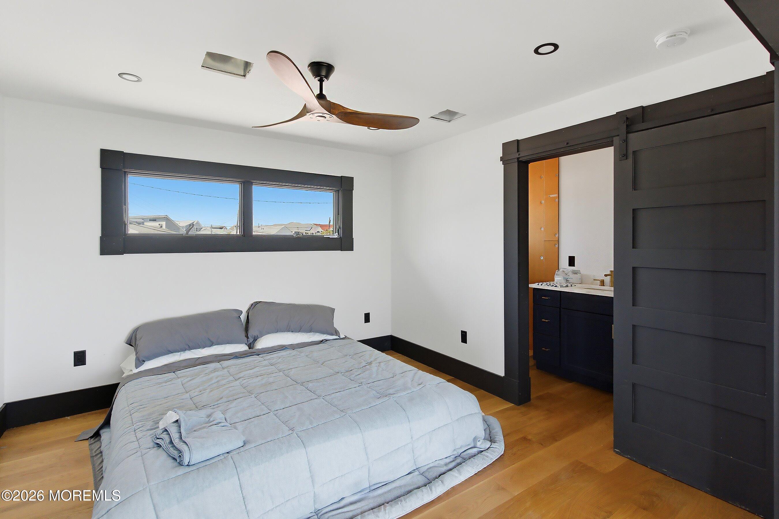 48 Parker Road Tuckerton, NJ 08087 - Photo 10 of 35 a bedroom with a bed and a walk in closet