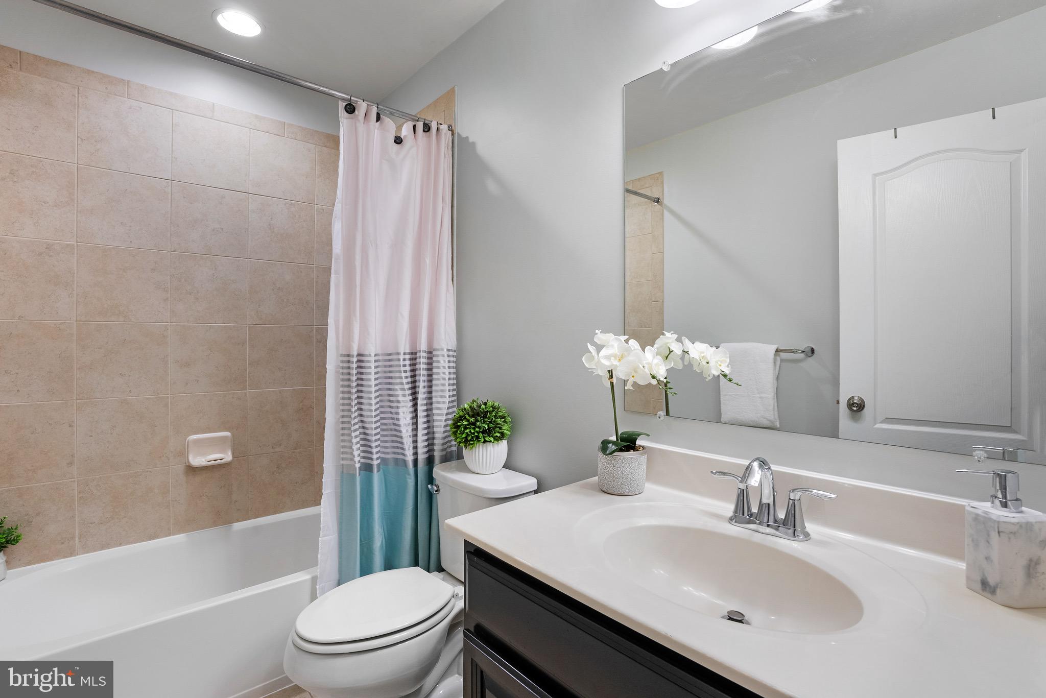 8022 Ravenclaw Road Elkridge, MD 21075 - Photo 16 of 24 Full Bathroom #2 | Tiled Tub Shower.