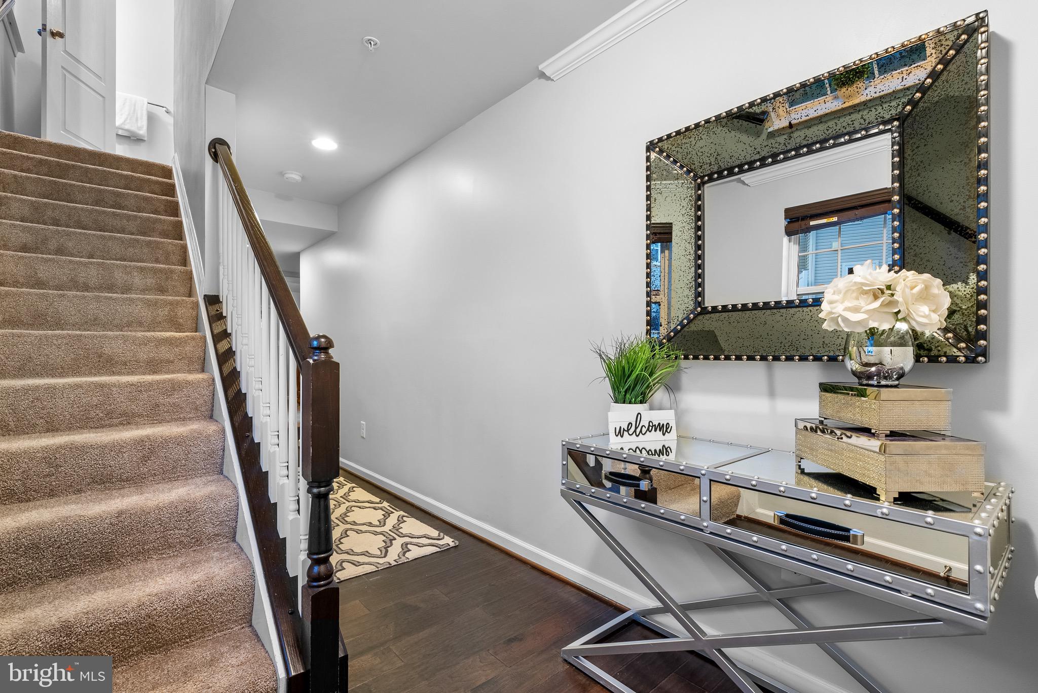 8022 Ravenclaw Road Elkridge, MD 21075 - Photo 18 of 24 Foyer w/ Crown Molding & Window for Natural Light.